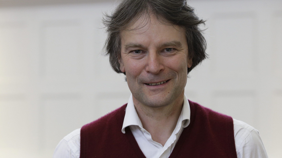 Headshot for Simon Channing