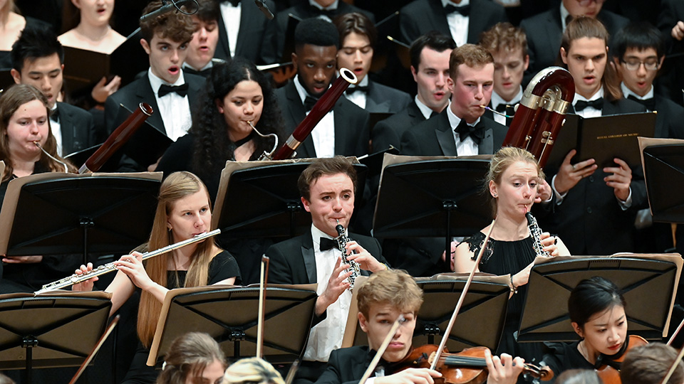 The woodwind section of the RCM Symphony Orchestra performing in a concert The woodwind section of the RCM Symphony Orchestra performing in a concert