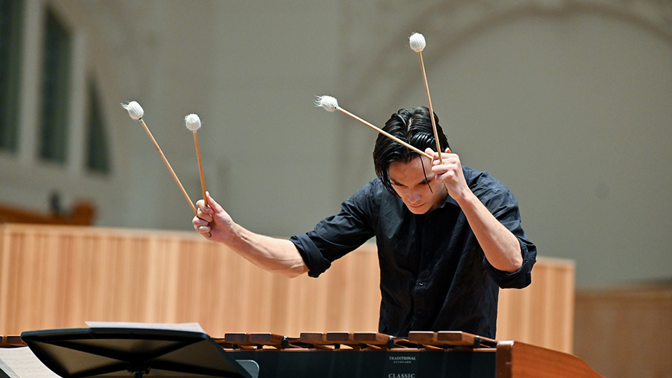 Student playing marimba Student playing marimba