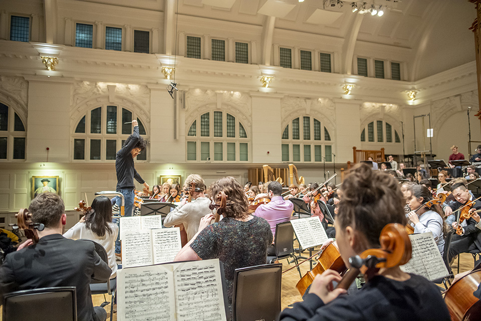Payare conducting an orchestral rehearsal at the RCM Payare conducting an orchestral rehearsal at the RCM