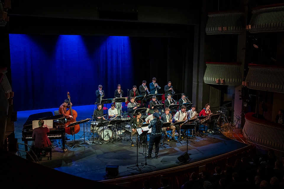 The RCM Jazz Orchestra perform on stage in the Britten Theatre
