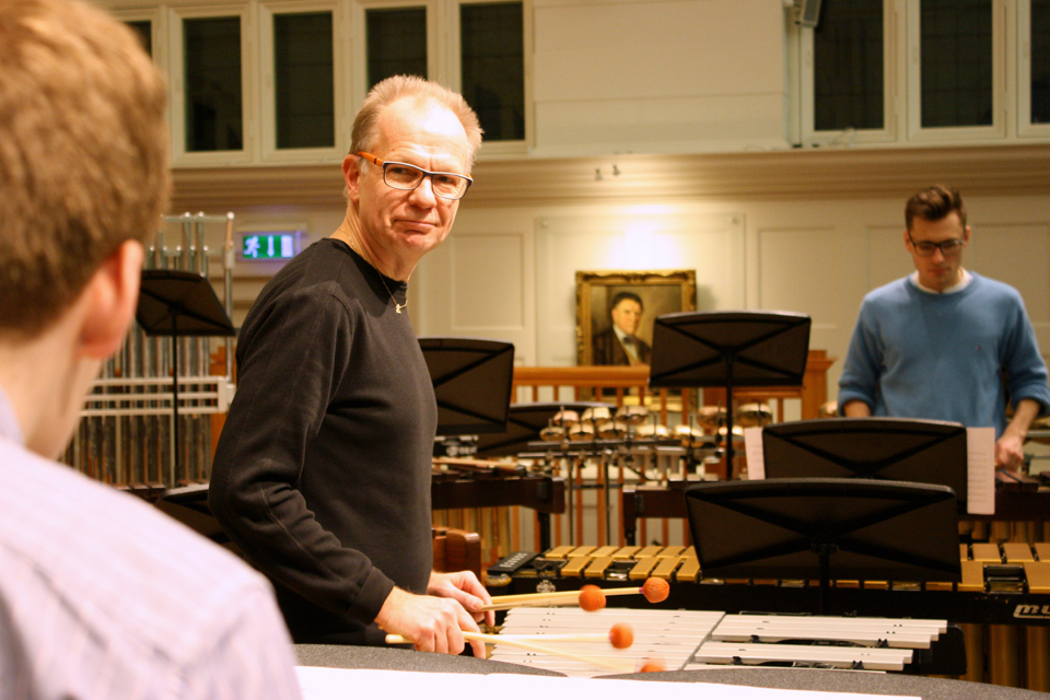 Guest artist Anders Astrand playing the xylophone with two students playing xylophones