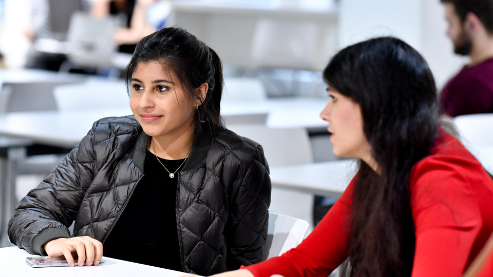 Students chatting in RCM Students' Union bar