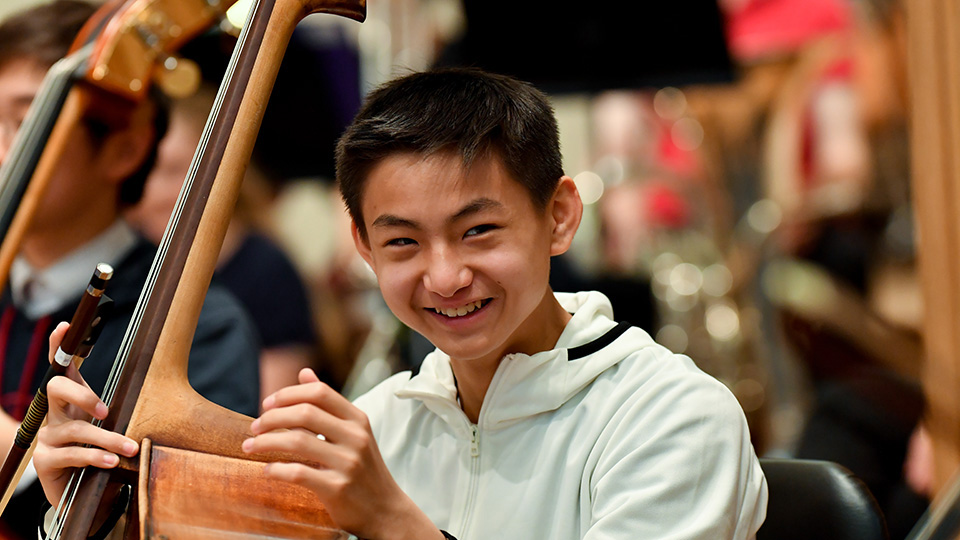 RCMJD double bassist in rehearsal