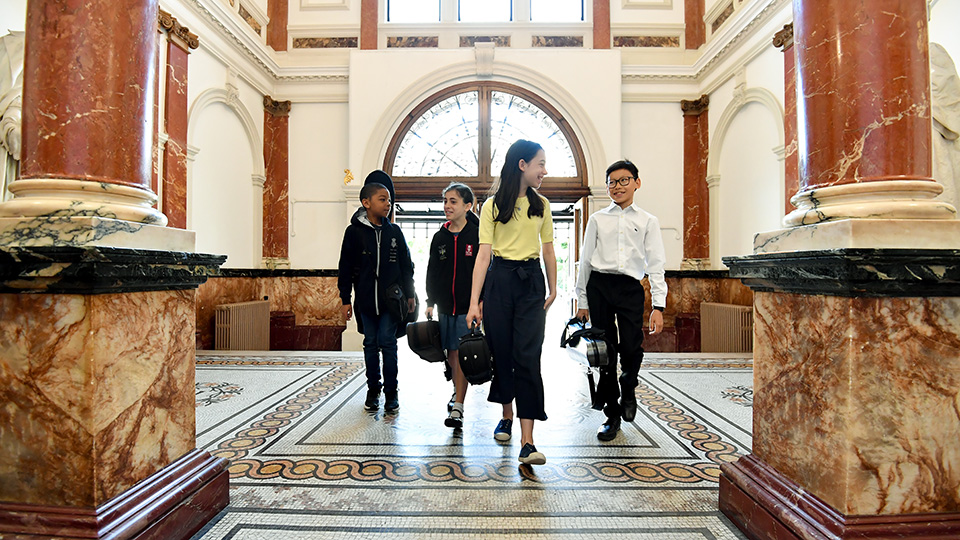 RCMJD students walking into RCM entrance hall RCMJD students walking into RCM entrance hall